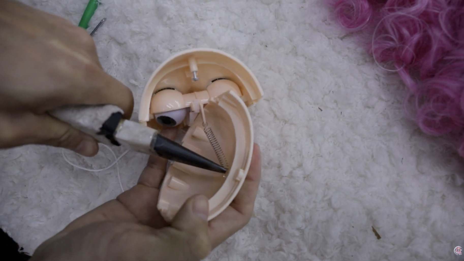 Setting the eyes and lashes into the Blythe doll faceplate