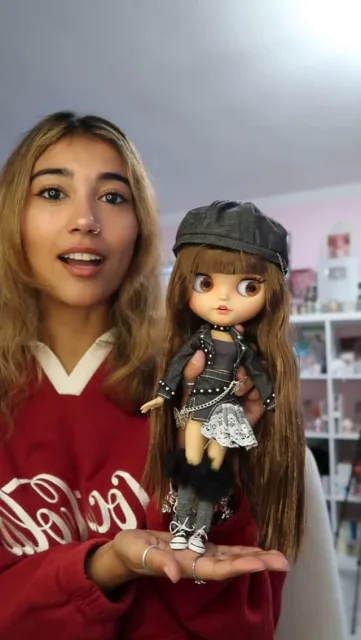 Happy collector holding her custom Neo Blythe doll