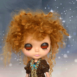A Blythe doll blinking and changing eye color with a pull of the string