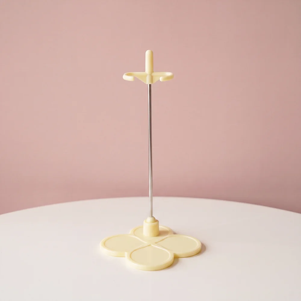 Neo Blythe Colorful Doll Stand 7 Yellow Blythe doll stand with waist grip on a blush pink background