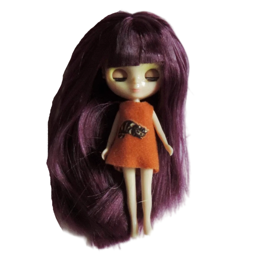 Petite Blythe laid down with her eyes closed